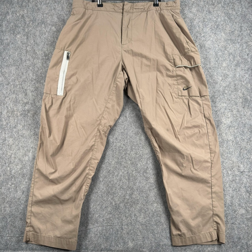 Nike Cargo Woven Pants Mens XL Beige Relaxed Fit Elastic Waist Hiking Outdoor